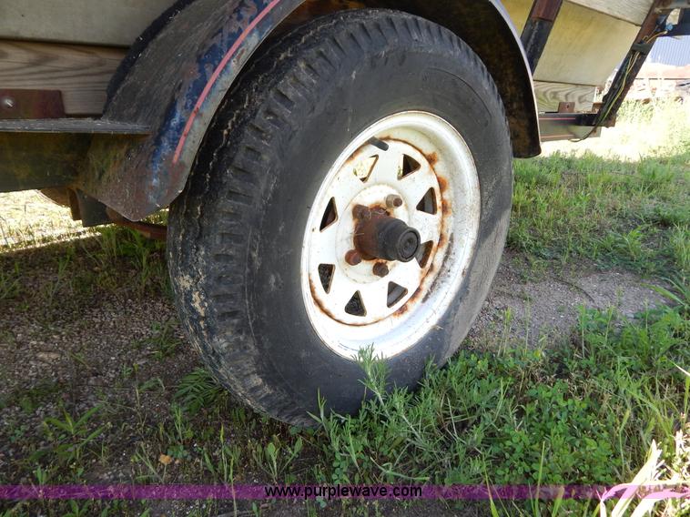 image for item G3212 1989 Alweld aluminum fishing boat and trailer