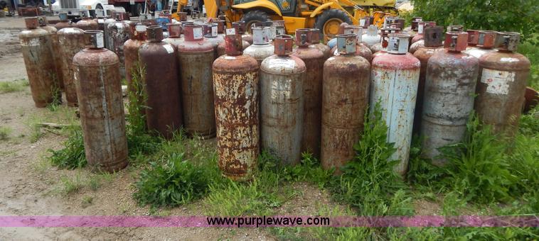 image for item G3234 Approximately 60 propane tanks