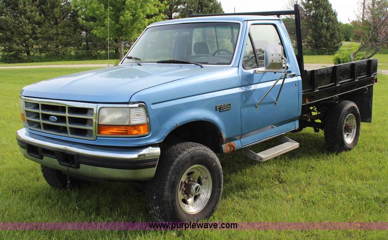 image for item G5239 1996 Ford F350 XL flatbed pickup truck