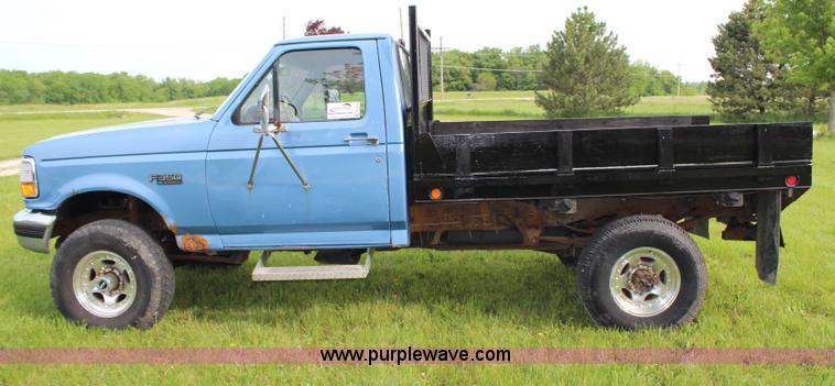 image for item G5239 1996 Ford F350 XL flatbed pickup truck