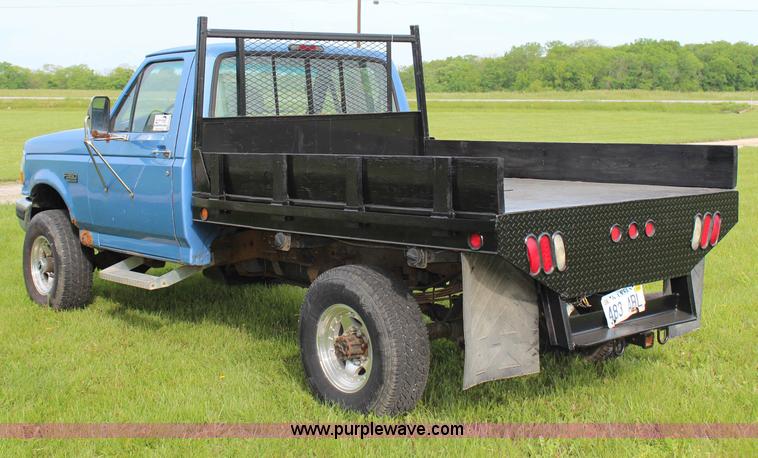 image for item G5239 1996 Ford F350 XL flatbed pickup truck
