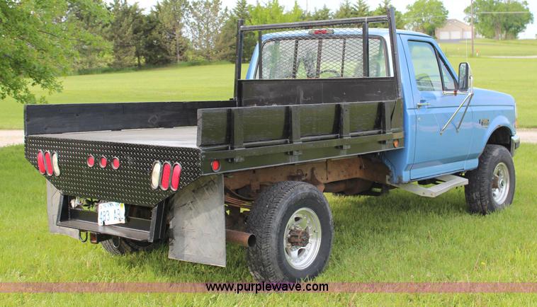 image for item G5239 1996 Ford F350 XL flatbed pickup truck