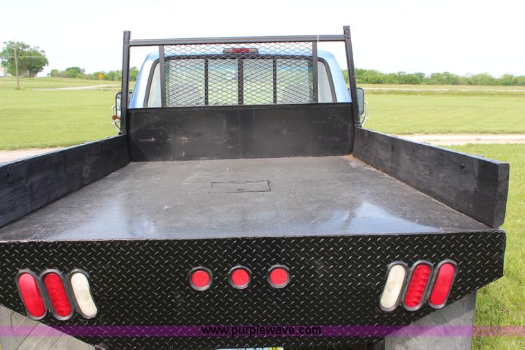 image for item G5239 1996 Ford F350 XL flatbed pickup truck