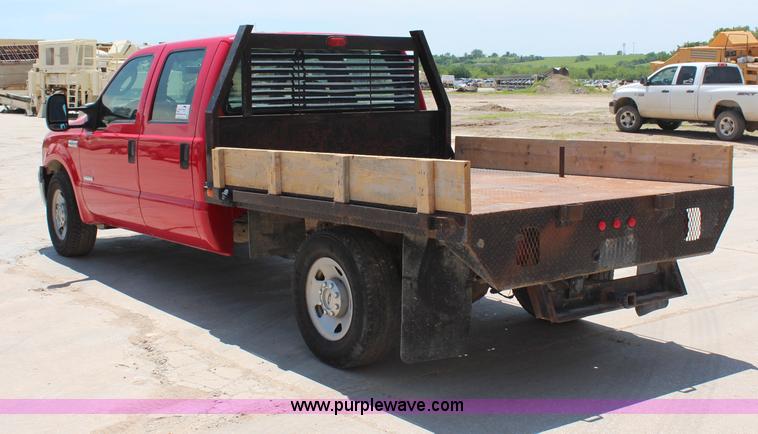 image for item G5250 2006 Ford F350 XL Super Duty Crew Cab flatbed pickup truck