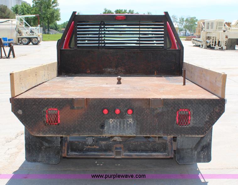 image for item G5250 2006 Ford F350 XL Super Duty Crew Cab flatbed pickup truck