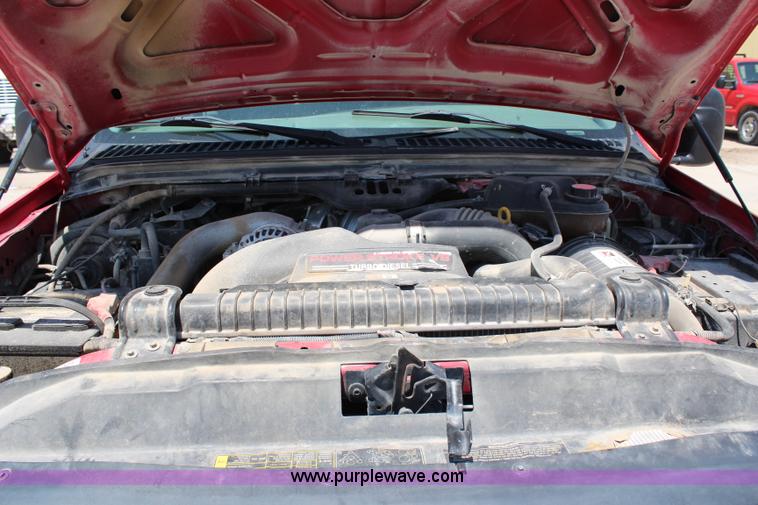 image for item G5250 2006 Ford F350 XL Super Duty Crew Cab flatbed pickup truck