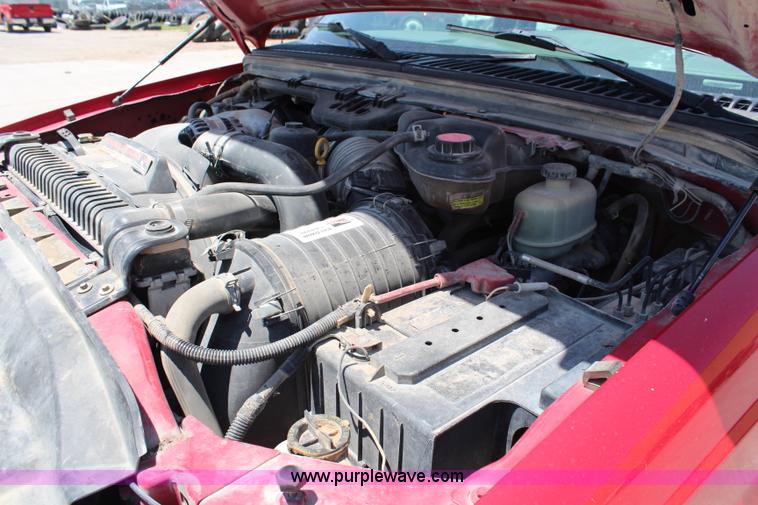 image for item G5250 2006 Ford F350 XL Super Duty Crew Cab flatbed pickup truck