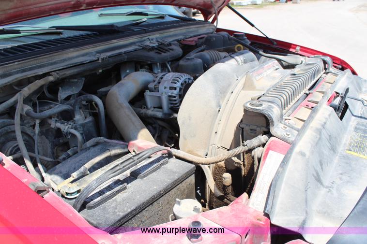 image for item G5250 2006 Ford F350 XL Super Duty Crew Cab flatbed pickup truck