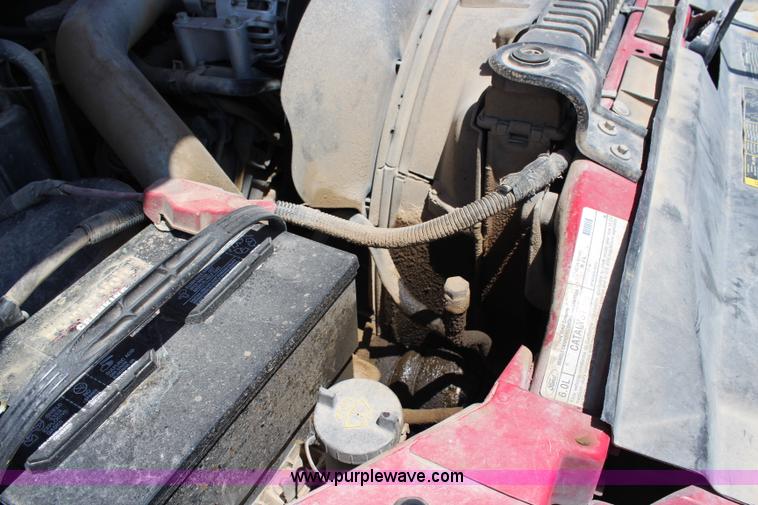 image for item G5250 2006 Ford F350 XL Super Duty Crew Cab flatbed pickup truck