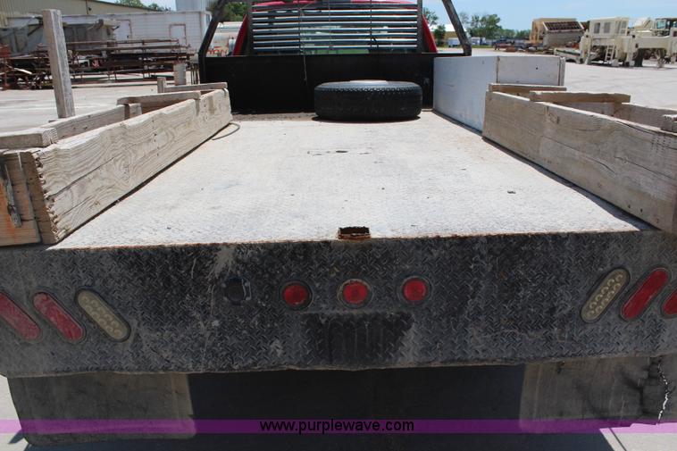 image for item G5471 2006 Ford F350 XL Super Duty Crew Cab flatbed pickup truck