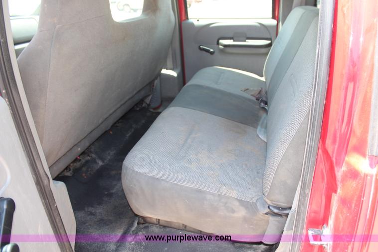 image for item G5496 2005 Ford F350 XL Super Duty Crew Cab flatbed pickup truck