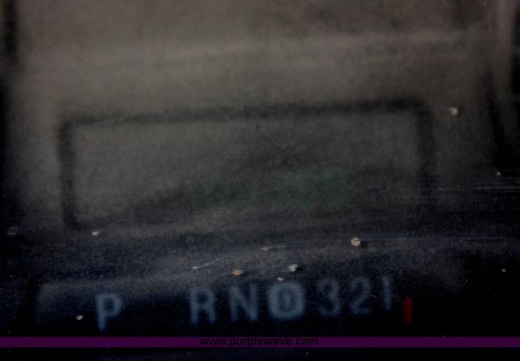 image for item G5496 2005 Ford F350 XL Super Duty Crew Cab flatbed pickup truck