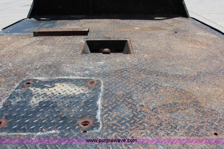 image for item G5496 2005 Ford F350 XL Super Duty Crew Cab flatbed pickup truck