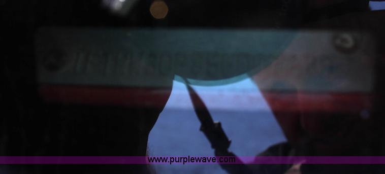 image for item G5496 2005 Ford F350 XL Super Duty Crew Cab flatbed pickup truck