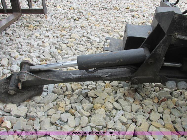 image for item AB9369 Ford New Holland B124 skid steer backhoe attachment