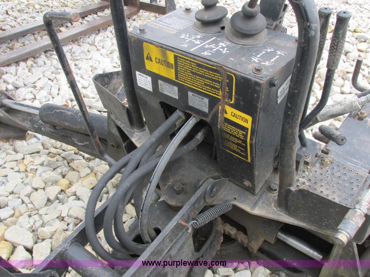 image for item AB9369 Ford New Holland B124 skid steer backhoe attachment