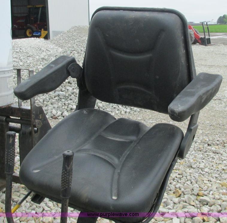 image for item AB9369 Ford New Holland B124 skid steer backhoe attachment