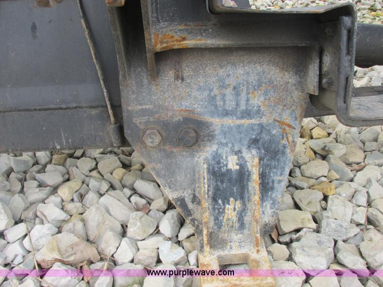 image for item AB9369 Ford New Holland B124 skid steer backhoe attachment