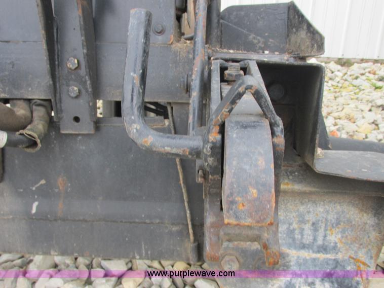 image for item AB9369 Ford New Holland B124 skid steer backhoe attachment