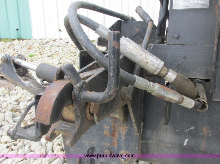 image for item AB9369 Ford New Holland B124 skid steer backhoe attachment