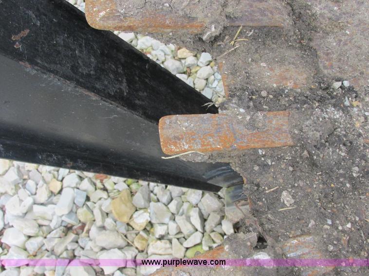 image for item AB9369 Ford New Holland B124 skid steer backhoe attachment
