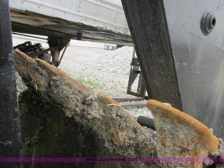 image for item AB9369 Ford New Holland B124 skid steer backhoe attachment