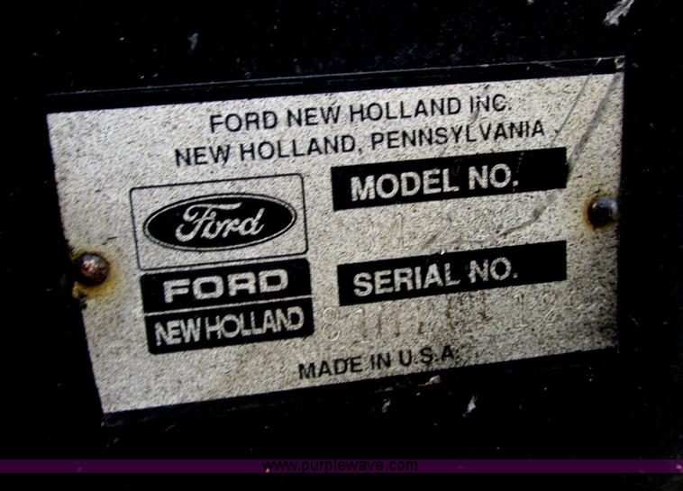 image for item AB9369 Ford New Holland B124 skid steer backhoe attachment