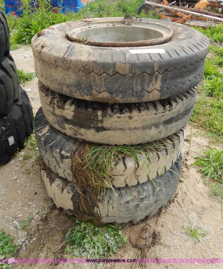 image for item AE9866 (4) 16-20 tires and wheels