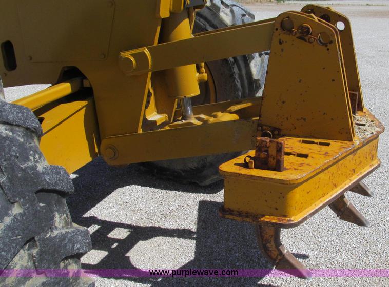 image for item E3992 1992 John Deere 670A articulated motor grader