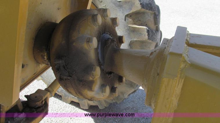 image for item E3992 1992 John Deere 670A articulated motor grader