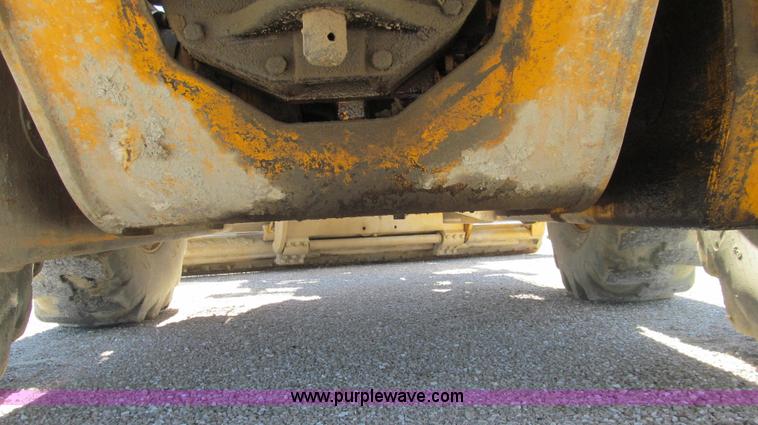 image for item E3992 1992 John Deere 670A articulated motor grader