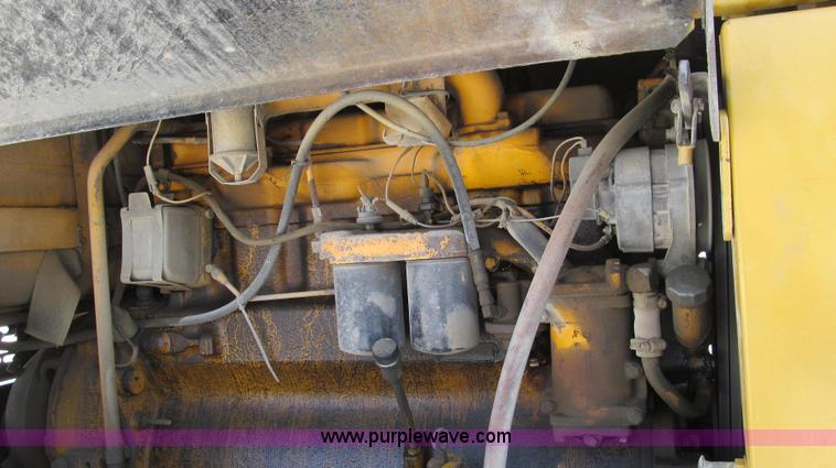 image for item E3992 1992 John Deere 670A articulated motor grader