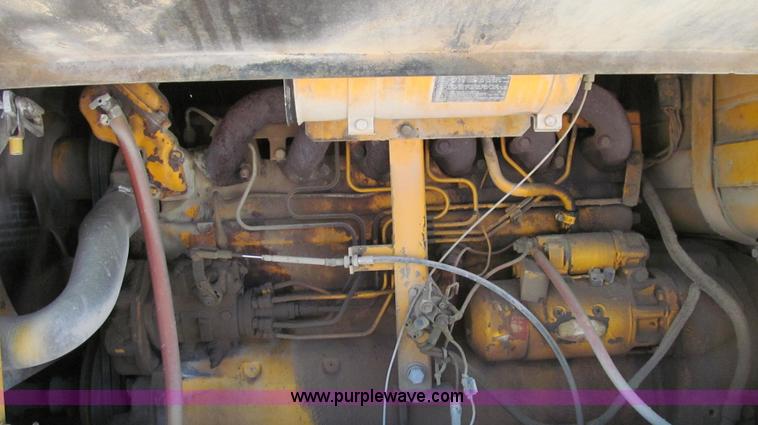 image for item E3992 1992 John Deere 670A articulated motor grader