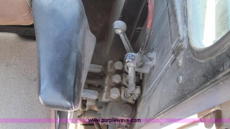 image for item E3992 1992 John Deere 670A articulated motor grader