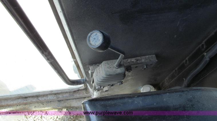 image for item E3992 1992 John Deere 670A articulated motor grader