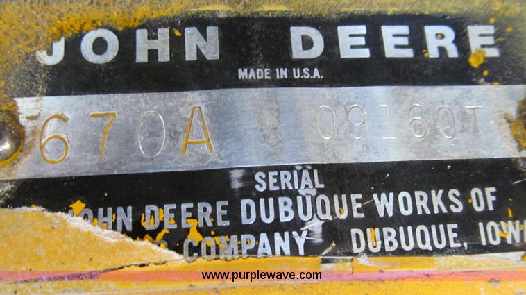 image for item E3992 1992 John Deere 670A articulated motor grader