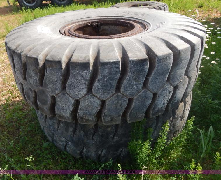 image for item G3230 (4) used 18-25 tires and 12 hole wheels