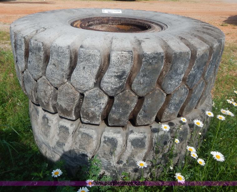 image for item G3230 (4) used 18-25 tires and 12 hole wheels