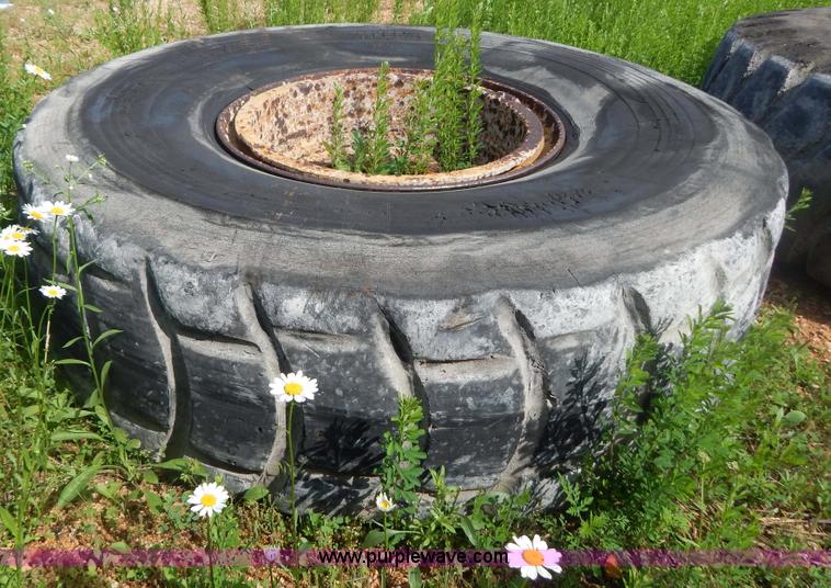 image for item G3230 (4) used 18-25 tires and 12 hole wheels