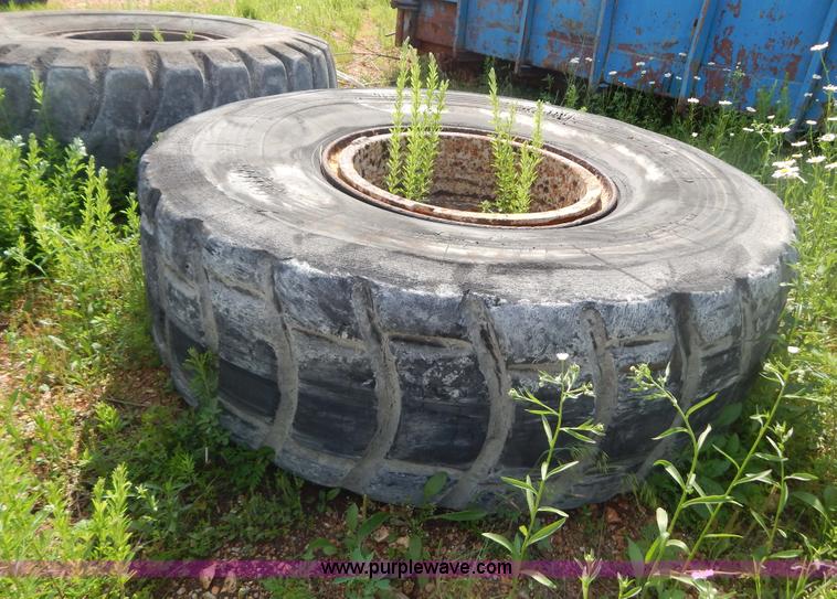 image for item G3230 (4) used 18-25 tires and 12 hole wheels