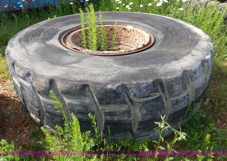 image for item G3230 (4) used 18-25 tires and 12 hole wheels