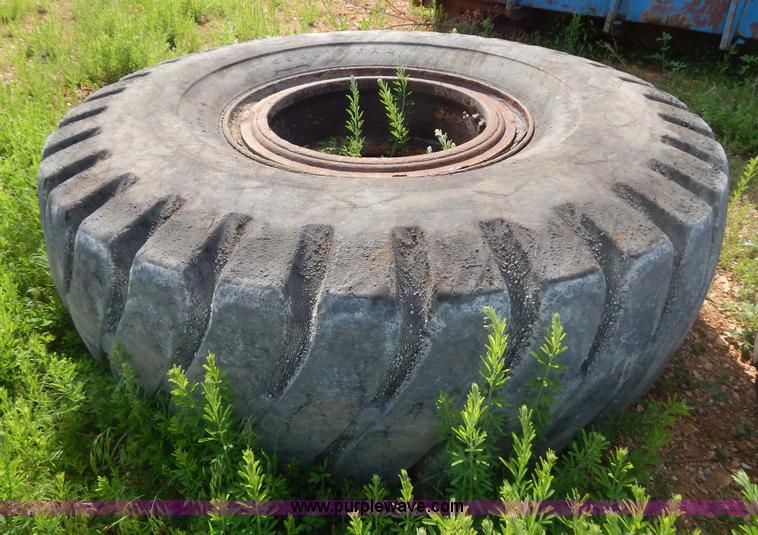 image for item G3230 (4) used 18-25 tires and 12 hole wheels
