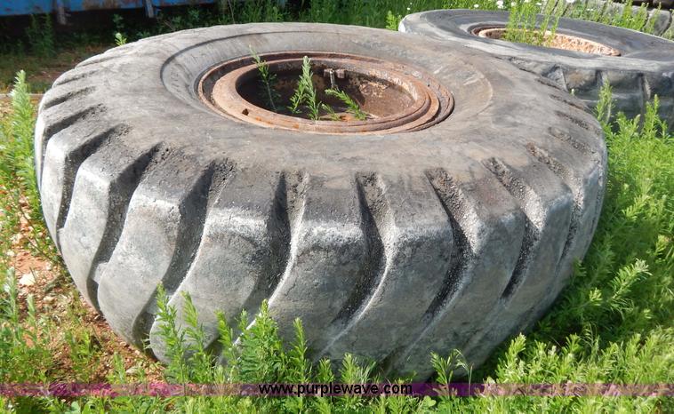 image for item G3230 (4) used 18-25 tires and 12 hole wheels
