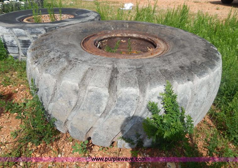 image for item G3230 (4) used 18-25 tires and 12 hole wheels