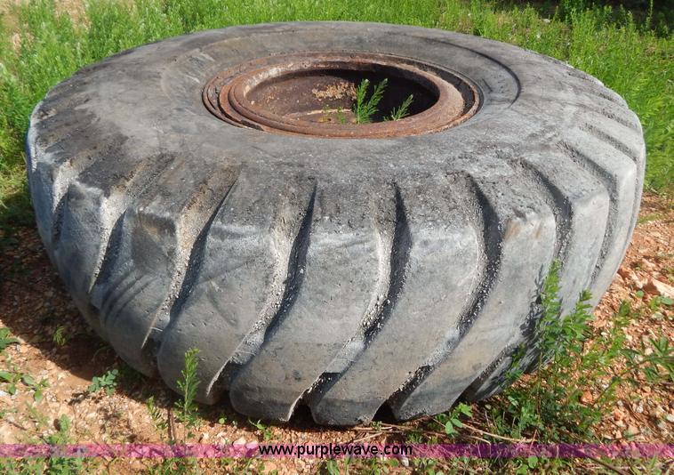 image for item G3230 (4) used 18-25 tires and 12 hole wheels