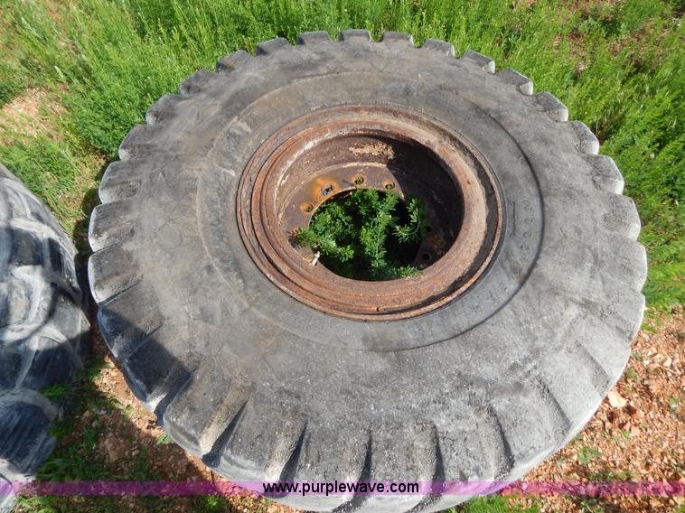 image for item G3230 (4) used 18-25 tires and 12 hole wheels