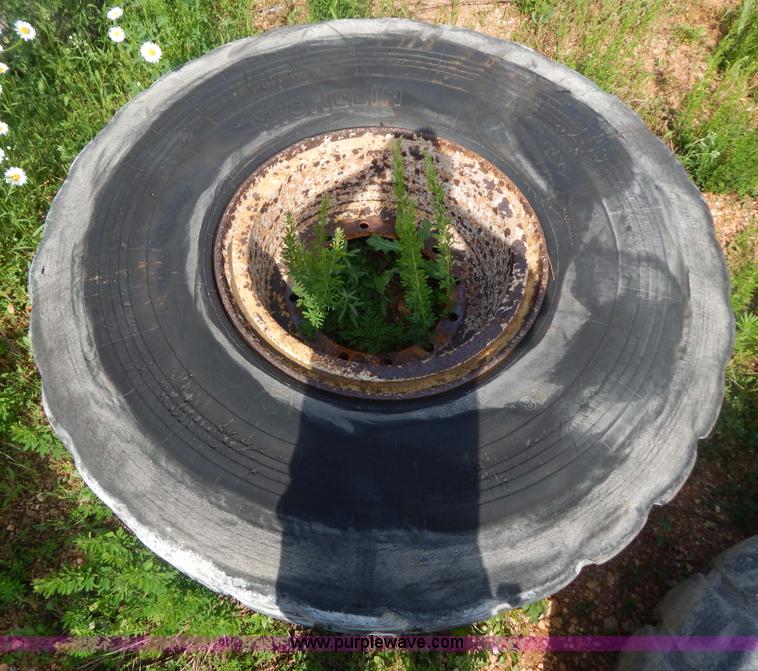 image for item G3230 (4) used 18-25 tires and 12 hole wheels