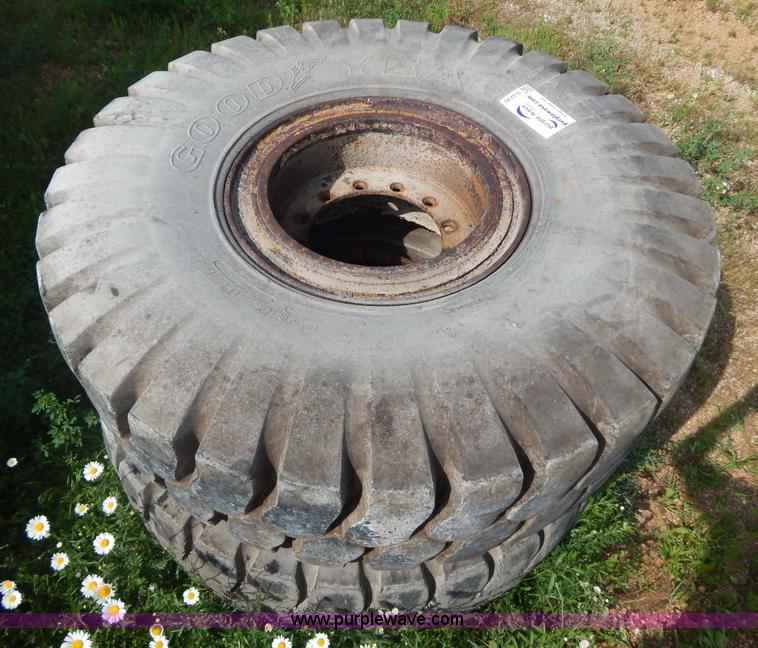 image for item G3230 (4) used 18-25 tires and 12 hole wheels