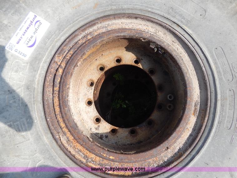 image for item G3230 (4) used 18-25 tires and 12 hole wheels
