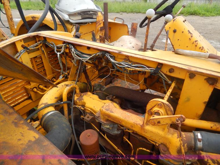 image for item G3235 John Deere elevating scraper